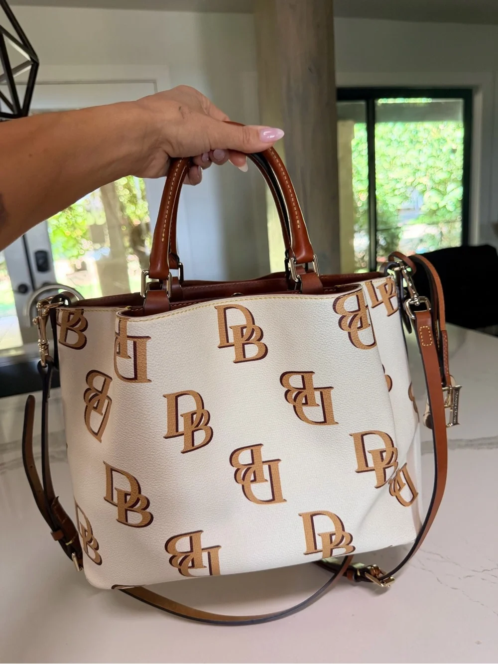 Dooney & Bourke Cream Satchel with Brown Logo Print